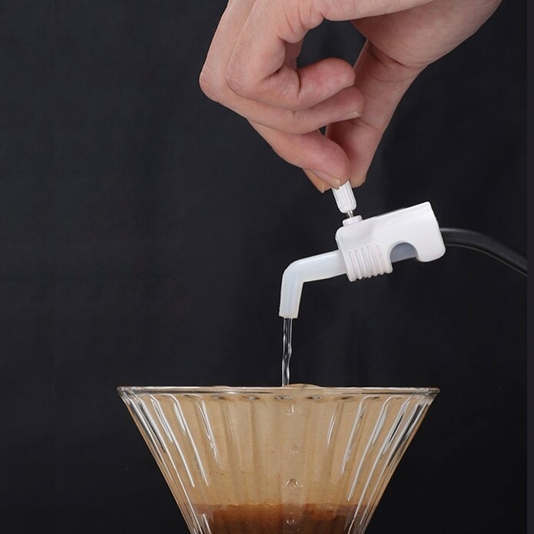 Coffee dripping pot restrictor nozzle