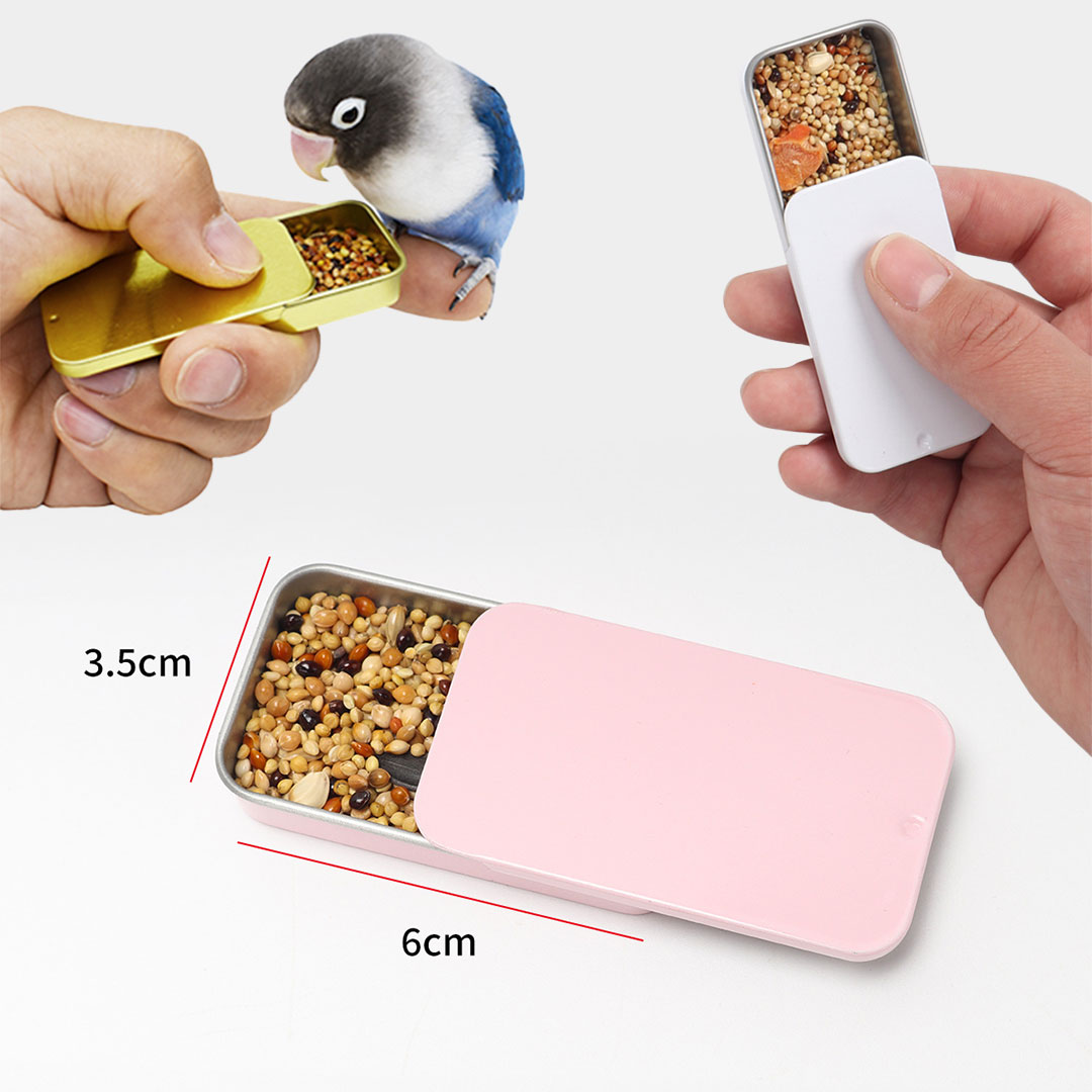 علبة طعام لتعليم الطيور لون  زهري